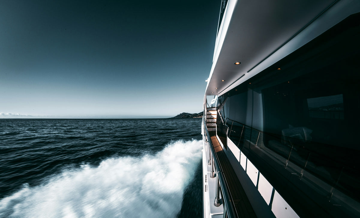Superyacht underway on open water